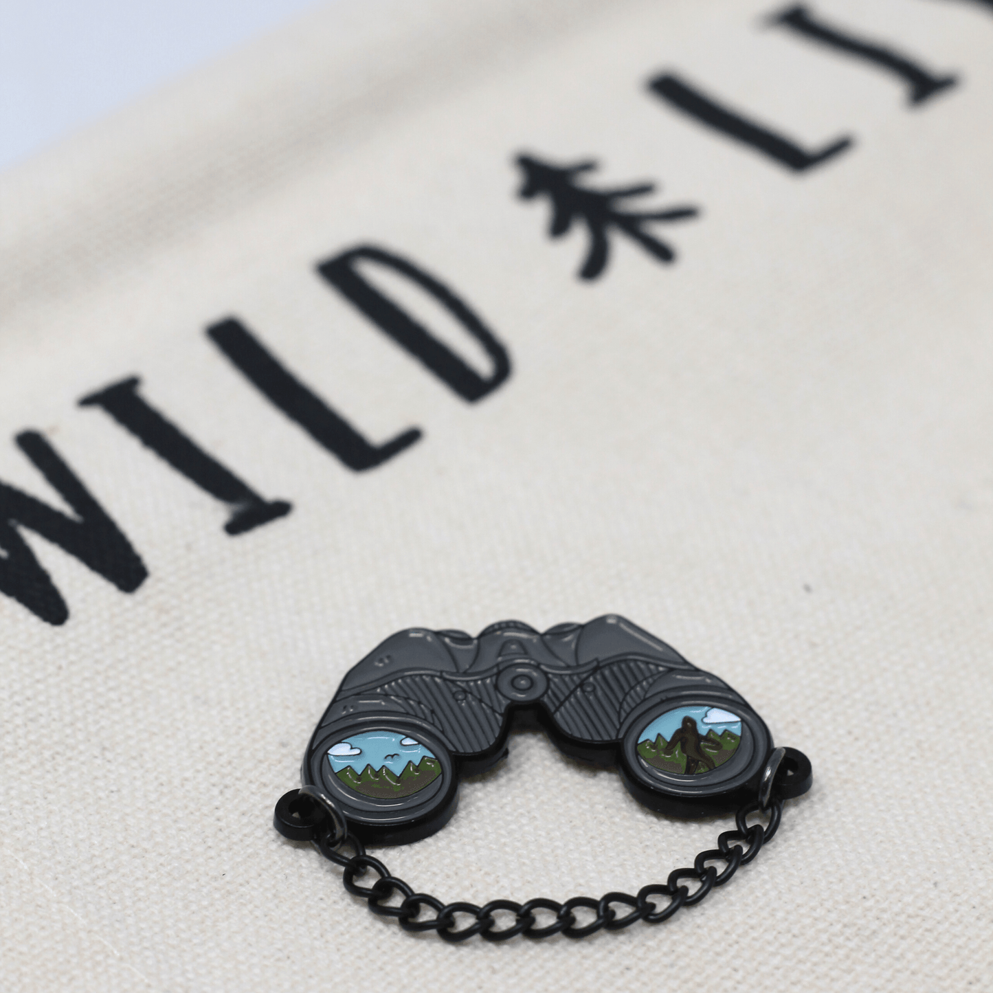Binocular with Sasquatch Merit Pin