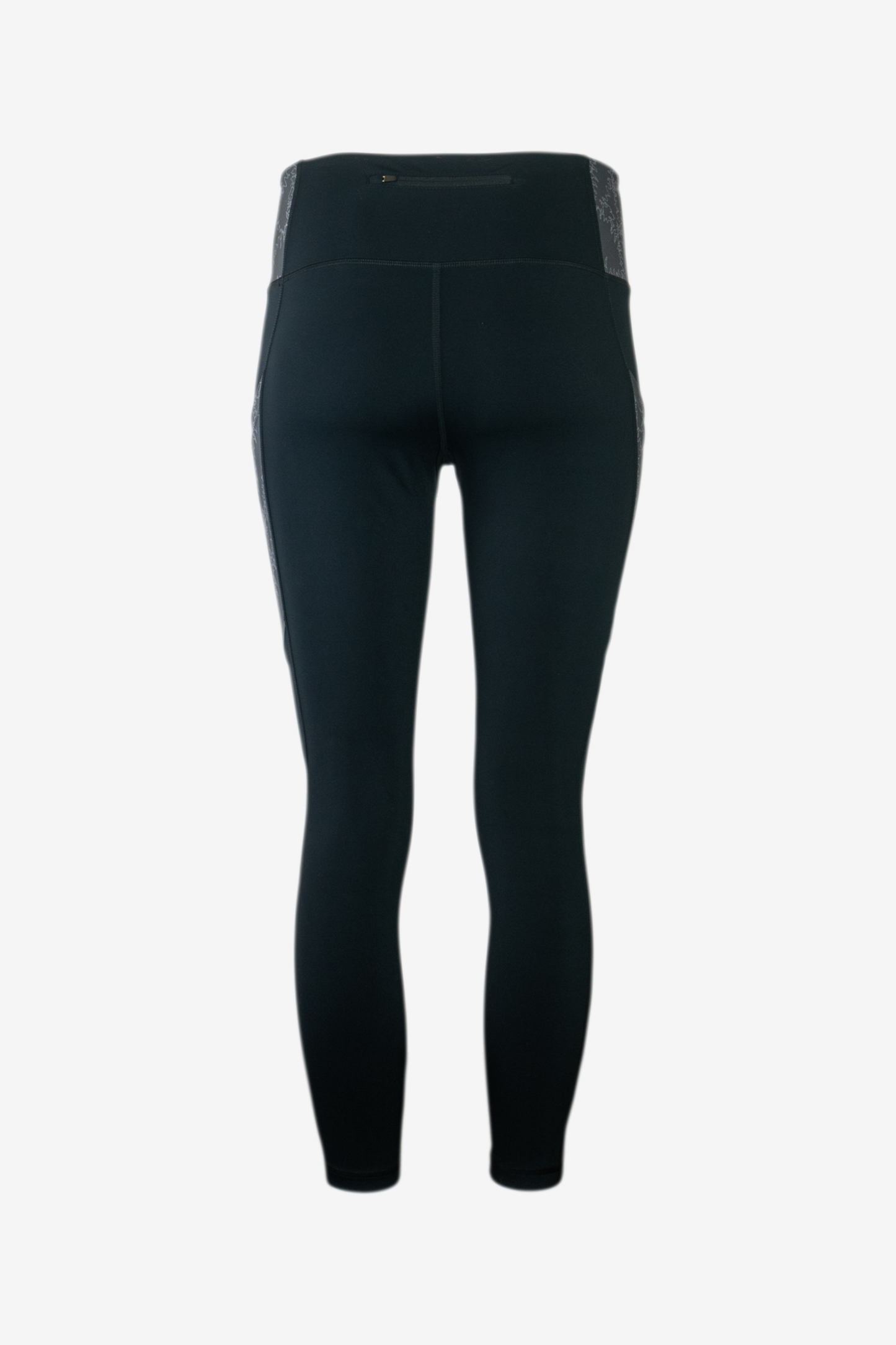 The Trailhead 7/8 Leggings from Belong Designs are black athletic leggings with a high waist and calf-length cut. They feature a colorful striped pattern in shades of purple and blue on the waist and leg panels. Crafted from PrimaFlex material, these multi-pocketed leggings also display a small logo on the left leg against a white background.