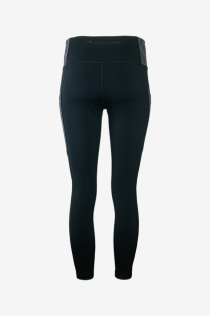 The Trailhead 7/8 Leggings from Belong Designs are black athletic leggings with a high waist and calf-length cut. They feature a colorful striped pattern in shades of purple and blue on the waist and leg panels. Crafted from PrimaFlex material, these multi-pocketed leggings also display a small logo on the left leg against a white background.
