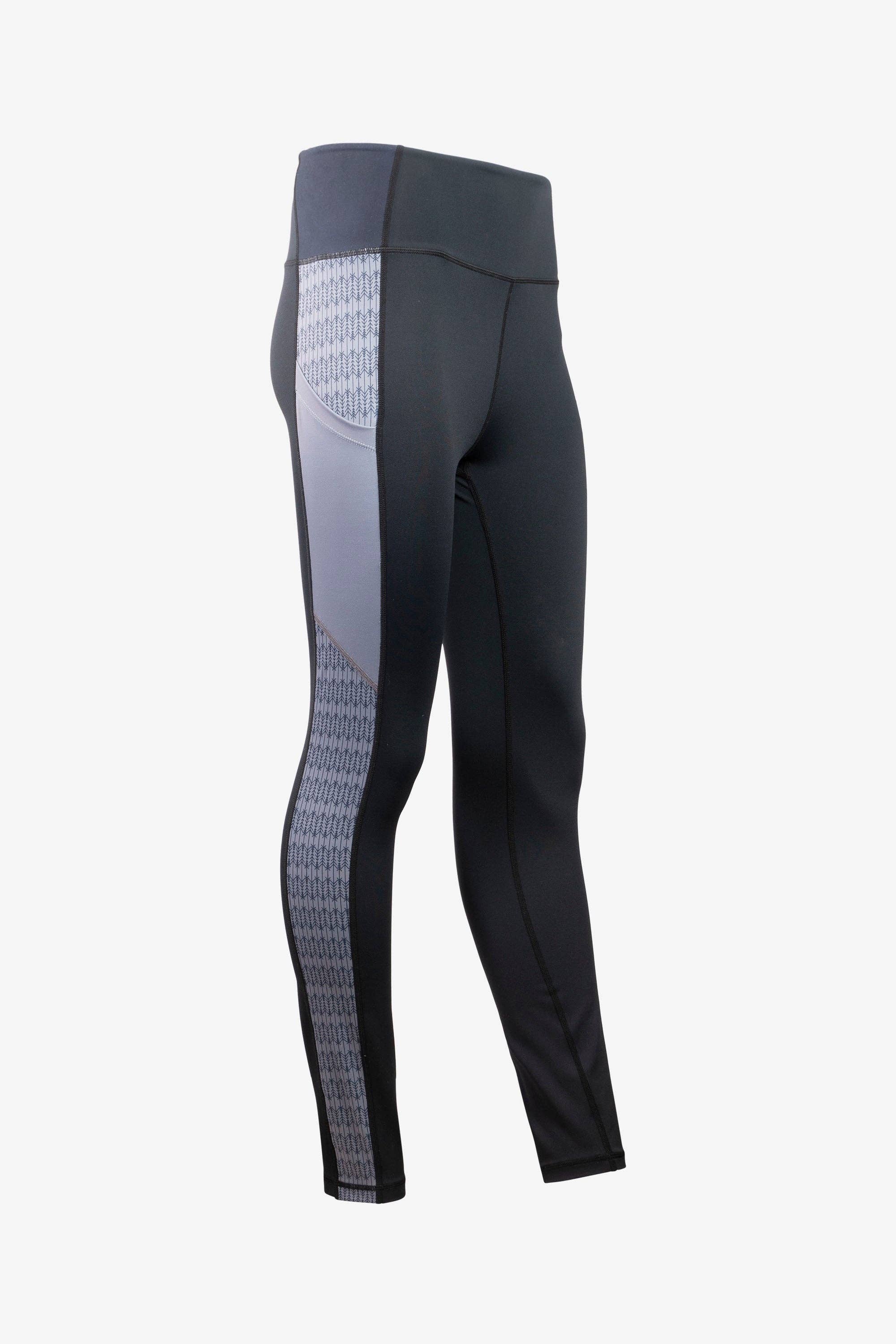 A pair of Trailhead Leggings in black and gray from Belong Designs, featuring a high waistband and vertical striped pattern on the side panels from waistband to ankle. Crafted from smooth and stretchy PrimaFlex material, these leggings are perfect for both athletic and casual wear. They also come with multiple pockets for added convenience.